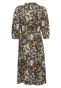 Ziedu raksta kleita dabīgi zaļos, brūnos un krēmkrāsas toņos. Ar elkoni garām piedurknēm un saspringtu jostasvietu, kas veido pievilcīgu siluetu.