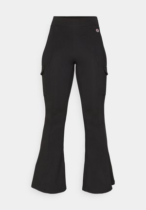 Black flared cargo pants made from stretchy fabric. Features side pockets and a high waistband. Smooth texture with minimal detailing.