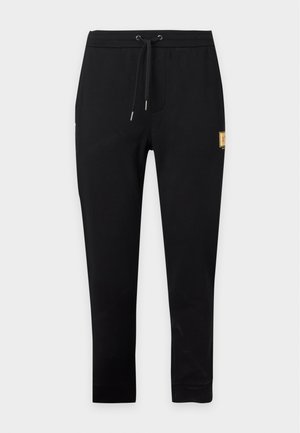 Armani Exchange, Pantalon de survêtement - black/gold-coloured