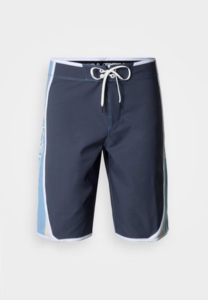 Meeste sinised ujumispüksid, millel on külgpaneelid helesinises ja beežis värvitoonis. Valmistatud kiiresti kuivavast kangast, millel on nöörkinnitusega vöökoht ja kontrastõmblused.