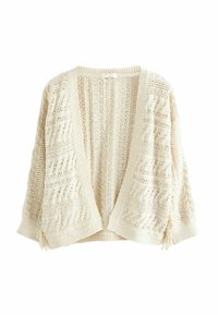 Creme oversized cardigan med åben front, struktureret strikkemønster, brede ærmer og frynse detaljer ved manchetterne.