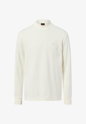 Crème-kleurige blouse met lange mouwen, gemaakt van zachte stof, met een hoge kraag en een klein geborduurd logo op de borst.