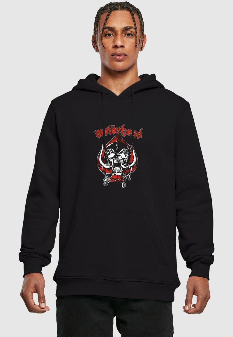 Black hoodie featuring a graphic print of a skull with horns and the text "Motörhead" in red and white, front kangaroo pocket, ribbed cuffs.