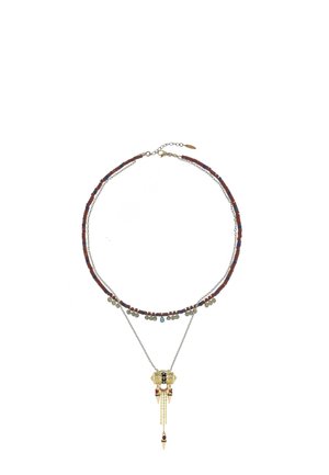 Delicate double-strand necklace with red and blue beads, small gold charms, and a gold pendant featuring chains and colored stones.