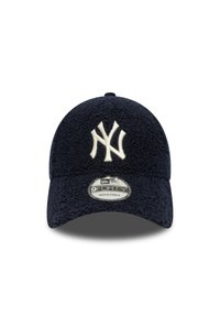 Casquette de baseball ajustable navy en tissu velouté ; présente un logo "NY" brodé en blanc à l'avant et une visière courbée.