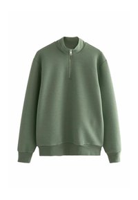 Sweatshirt matelassé vert avec col haut, fermeture éclair quart de zip à l'avant, poignets et ourlet côtelés. Présente un motif texturé en forme d'hexagone.