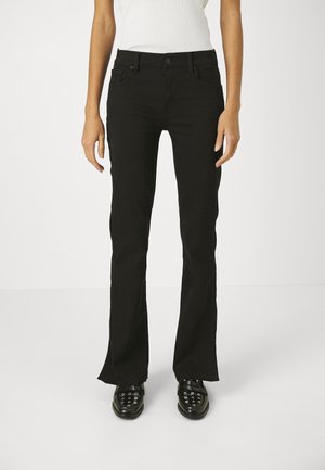 Black flared jeans with a slim fit, made from denim. Features front pockets, a button closure, and raw hem detail at the ankles.