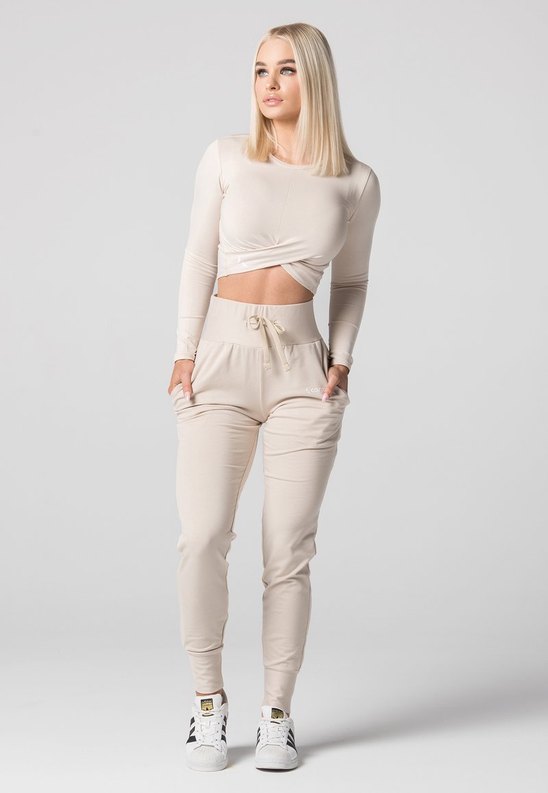Damen Sportbekleidung | carpatree BELLE SWEATPANTS Jogginghose beige - LR49410 Damen Sportbekleidung | carpatree BELLE SWEATPANTS Jogginghose beige - LR49410