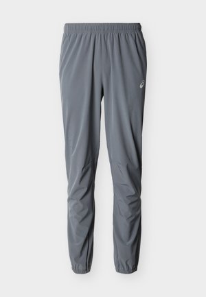 Sive lahke športne hlače z elastičnim pasom in robovi, z majhnim logotipom na zgornjem delu stegna.