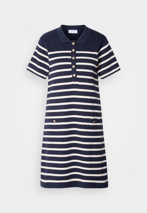 Mornarsko modra in bela črtasta polo obleka s kratkimi rokavi, peti zlatimi gumbi, in dvema sprednjima žepoma z zlatimi detajli.