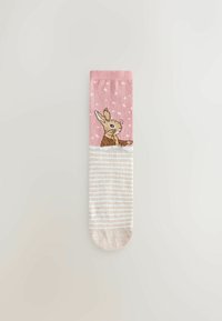 Knee-high socks featuring a pink top section with a rabbit design and white polka dots, transitioning to beige and cream stripes.