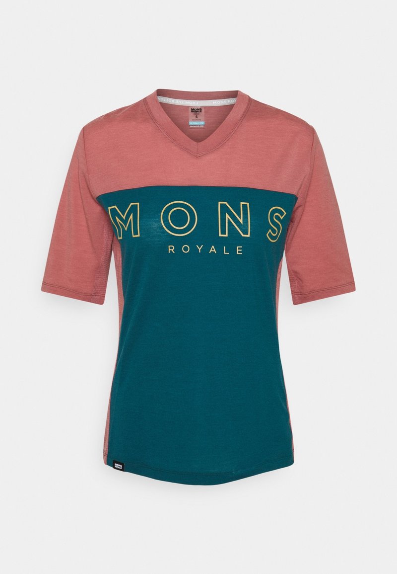 Camiseta de manga corta, con cuello en V, en rosa y verde azulado, con "MONS ROYALE" en letras amarillas en negrita a lo largo del pecho. Tejido suave, ajuste casual.
