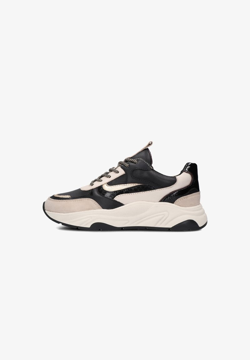 Black, beige, and gray sneaker with a mix of smooth and textured materials, featuring a chunky sole, rounded toe, and patterned accents.