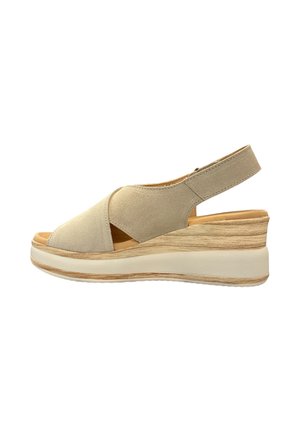 Sandale compensée en daim beige avec bout ouvert, brides croisées, bride arrière et semelle plateforme à texture bois clair.