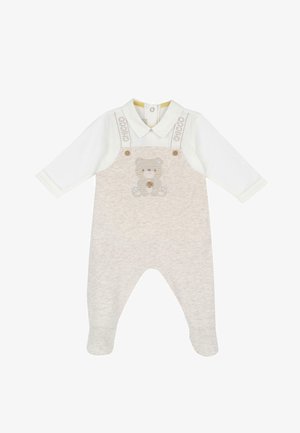 Salopette pour bébé en coton beige avec manches longues blanches, ornée d'une broderie d'ours sur la poitrine, bretelles ajustables et boutons décoratifs.