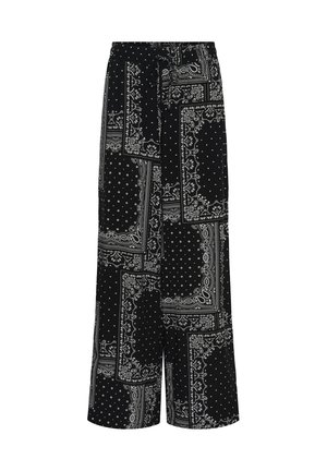 Pantalon noir à jambes larges avec taille haute et ceinture, présentant des motifs patchwork blancs paisley et à pois.