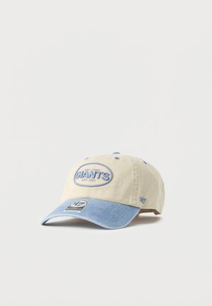 Beige and light blue baseball cap with "New York Giants Est. 1925" embroidered on front and an adjustable strap on the back.