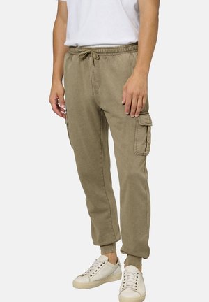 Khaki jogger pants with a drawstring waist, side pockets, and elastic cuffs, made from soft fabric with a casual fit.
