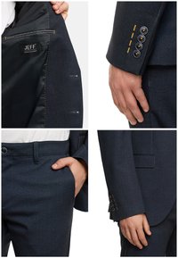 Odijelo tamnoplave boje kostrjenca s teksturiranim materijalom, detaljima s gumbima na rukavima i unutarnjim džepom na patentni zatvarač označenim kao "JEFF." Hlače imaju bočne džepove.