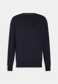 Granatowy sweter z okrągłym dekoltem, długimi rękawami i ściągaczami. Posiada małe logo na piersi. Miękka tekstura materiału.
