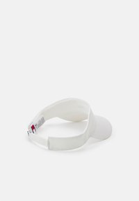 White visor cap with a curved brim, made of fabric with a smooth texture, featuring an adjustable strap and a small logo on the band.