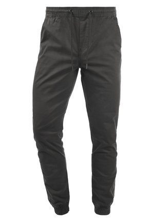Lichte zwarte joggingbroek van zacht materiaal, met een elastische tailleband, verstelbaar trekkoord en elastische boorden.
