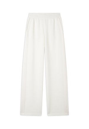 Pantaloni della tuta a gamba larga in tessuto crema, con due tasche laterali, un elastico in vita e una leggera trama a coste lungo il tessuto.