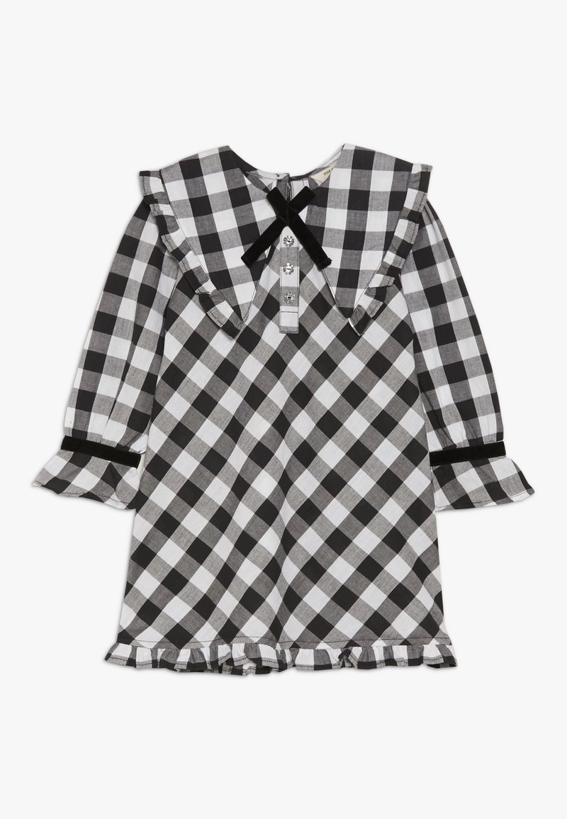 Robe à manches longues en vichy noir et blanc avec col volanté et ourlet, patte de boutonnage, nœud en velours noir et poignets de manches.