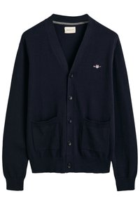 Marineblauer Cardigan aus weichem Stoff, mit V-Ausschnitt, knöpfbarem Frontverschluss, zwei Taschen vorne und einem kleinen Logo auf der Brust.