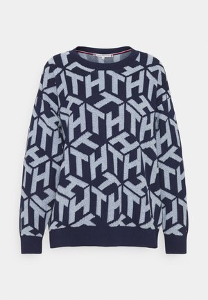 Pull bleu marine avec motif géométrique "TH" bleu clair sur toute la surface, col rond, manches longues et poignets et ourlet côtelés.