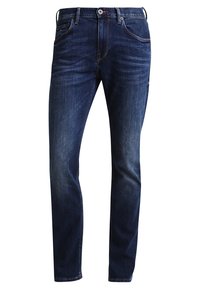 Mörkblå denimjeans med en lätt urblekt finish, standarddesign med fem fickor, knappstängning och rak benform.