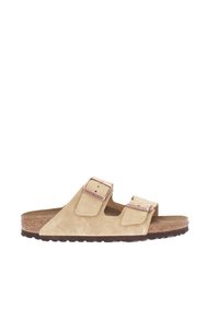 Sandalias de ante en beige con dos correas ajustables. Plantilla de corcho y suela de goma oscura. Diseño minimalista con detalles de costura reforzada.