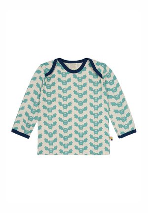 Langarmshirt van crèmekleurige katoen met een herhaald turkoois vleermuispatroon, voorzien van een marineblauwe ronde hals en manchetten.