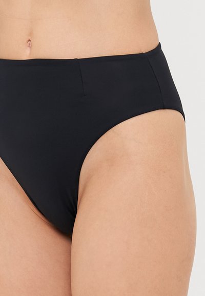 Schwarze, hochgeschnittene Bikinihose aus glattem, dehnbarem Stoff mit minimalen Nähten. Verfügt über ein sauberes, einfaches Design ohne Verzierungen.