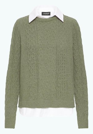 Green knitted sweater with a textured pattern, featuring a crew neckline and long sleeves, layered over a white collared shirt.