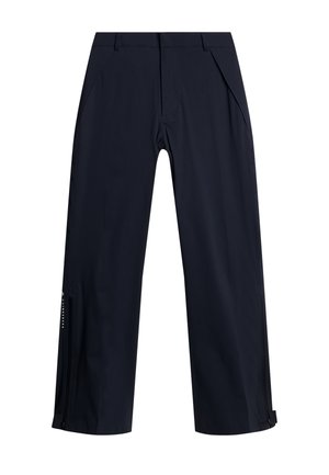 Donkerblauwe outdoorbroek gemaakt van lichtgewicht, waterafstotende stof. Voorzien van zijzakken en met ritsen aan de enkels voor ventilatie.