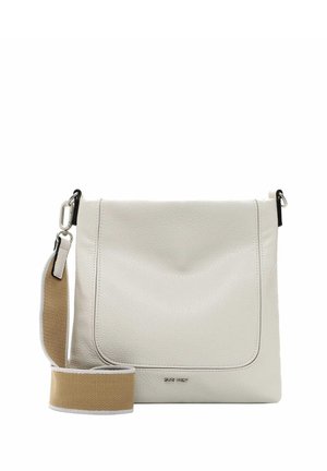 White leather crossbody bag with a textured surface, featuring a broad beige strap, silver hardware, and a flap closure.