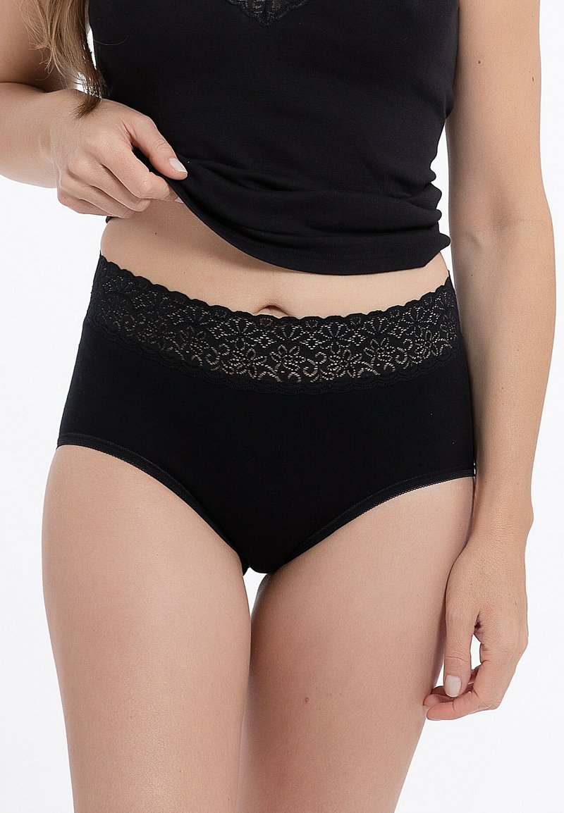 Schwarze Baumwoll-Hosen mit hoher Taille und einem Taillenbund aus floralem Spitze, die eine glatte Textur und nahtlose Kanten für zusätzlichen Komfort bieten.