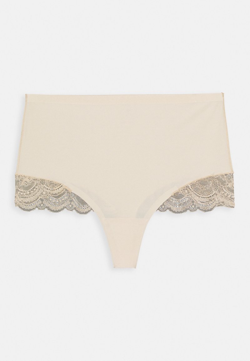 Beige undertøy med blonderkant på sidene. Myk, glatt stoff med bølget blonderkant som har intrikate mønstre og en subtil glans.