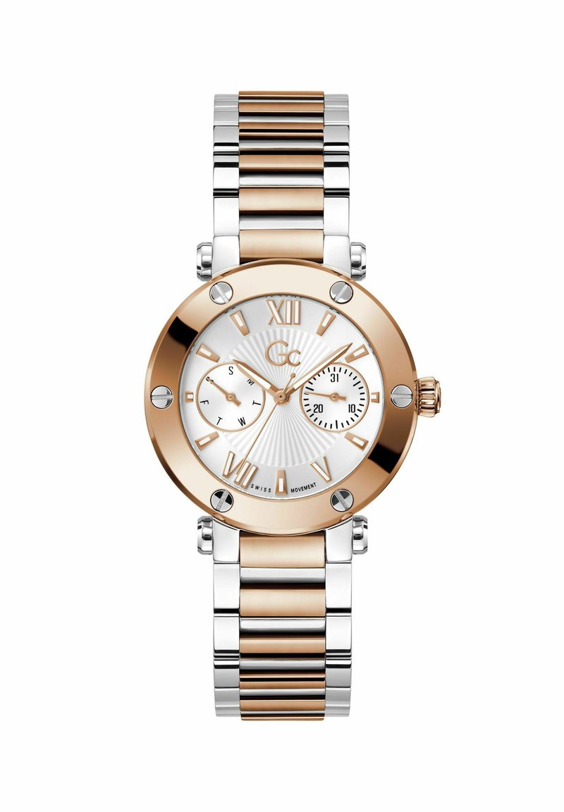 Orologio in metallo dorato e argentato con quadrante bianco, marker a numeri romani e due sottodial. Presenta uno sfondo testurizzato e una finitura lucida.
