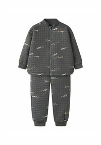 Completo sportivo grigio trapuntato con giacca con zip e polsini elasticizzati, caratterizzato da un motivo aereo ripetuto e una texture liscia in tutto il capo.