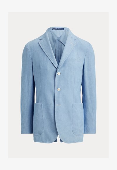 Ανοιχτό μπλε λινό σακάκι με notch γιακά, μπροστινό κούμπωμα με δύο κουμπιά και δύο μπροστινές τσέπες. Διαθέτει μία τσέπη στο στήθος και μίνιμαλ σχεδίαση.