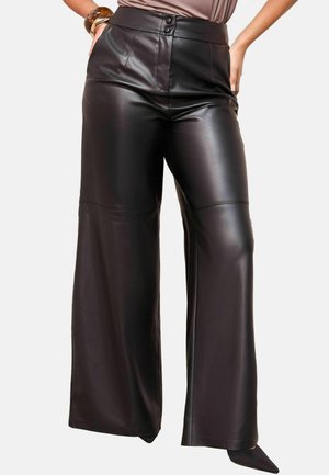 X LUCY MECKLENBURGH WIDE - Leather trousers - black