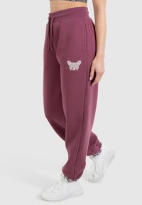 Smilodox NALA CASUAL JOGGERS - Trainingsbroek - dunkel rosa