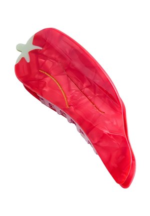 Red translucent plastic hair claw clip shaped like a chili pepper with a white stem detail.