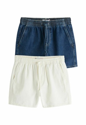 Două perechi de pantaloni scurți cu talie elastică și șnururi, unul albastru de denim și unul alb crem, așezate plat pe un fundal alb.