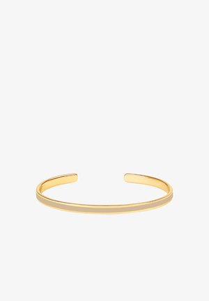 Bracelet en métal doré avec une surface lisse et poli. Les extrémités ouvertes permettent un ajustement flexible. Design simple et minimaliste.