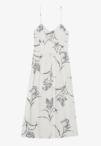 Robe d'été blanche à fines bretelles, ornée d'un imprimé floral noir. Le corsage est froncé, se prolongeant par une jupe fluide et décontractée.