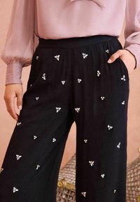 Love & Roses HAND EMBELLISHED WIDE LEG - Kelnės - black