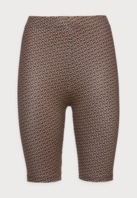 Bicycle shorts in a stretchy fabric with a brown and beige interlocking pattern. Mid-thigh length with a smooth texture and an elastic waistband.